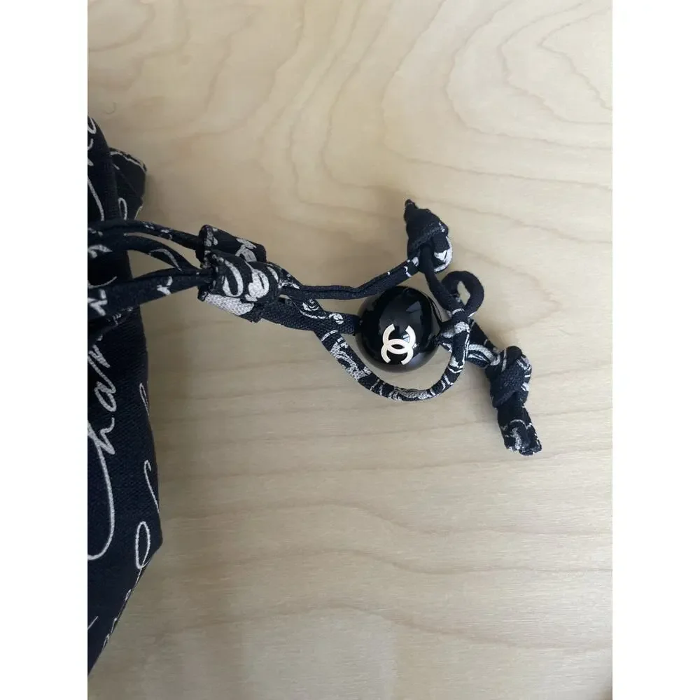 Chanel Graffiti Tote CC Print Camellia Drawstring Bag Black Cambon Mademoiselle